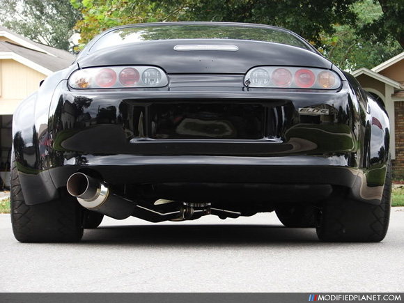 Black Wide Body Toyota Supra pimping a full stainless steel APEXi GT Spec 