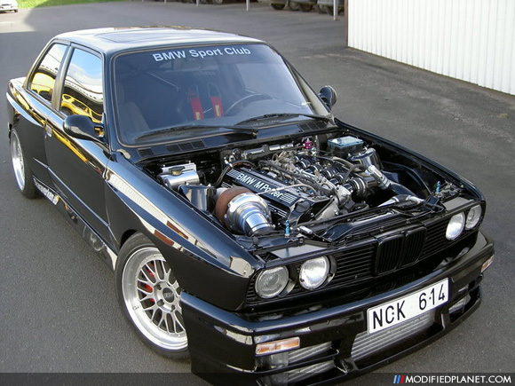 Great shot of a 1988 BMW M3 Turbo featuring a front mount intercooler BBS