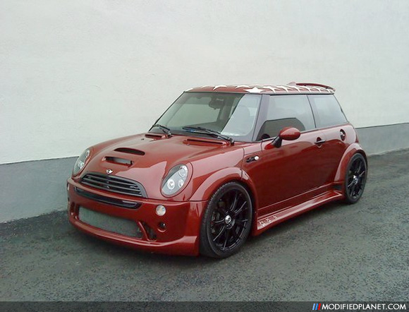 Set of Black 18 Konig Swurve wheels on a 2002 Mini Cooper S with Wide Body