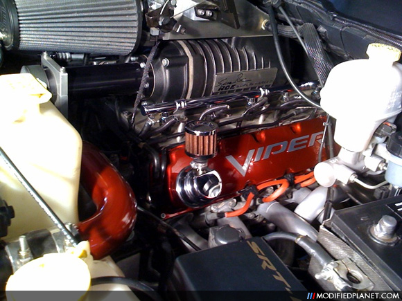 Engine bay photo of a 2006 Dodge Ram SRT10 featuring a Roe Racing Top Mount