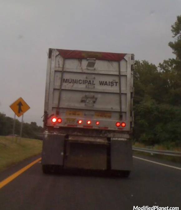 car-photo-semi-truck-carrying-municipal-waste-waist-spelling-fail