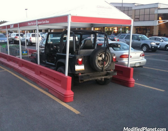 car-photo-1997-jeep-wrangler-shopping-cart-return-parking-fail