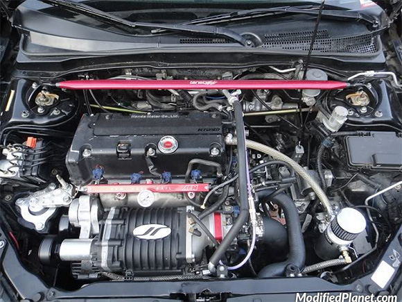 Modified 2005 Acura RSX Type-S engine bay featuring a Jackson Racing superc...