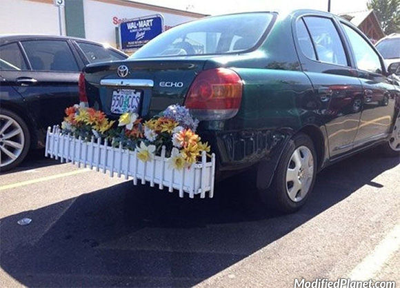 car-photo-2003-toyota-echo-flower-rack-on-rear-bumper